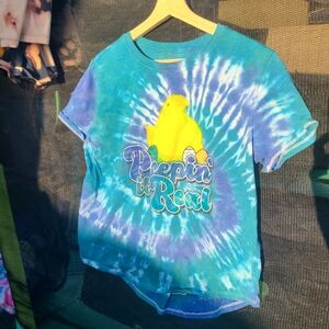Hand tie dyed "peepin it real" shirt